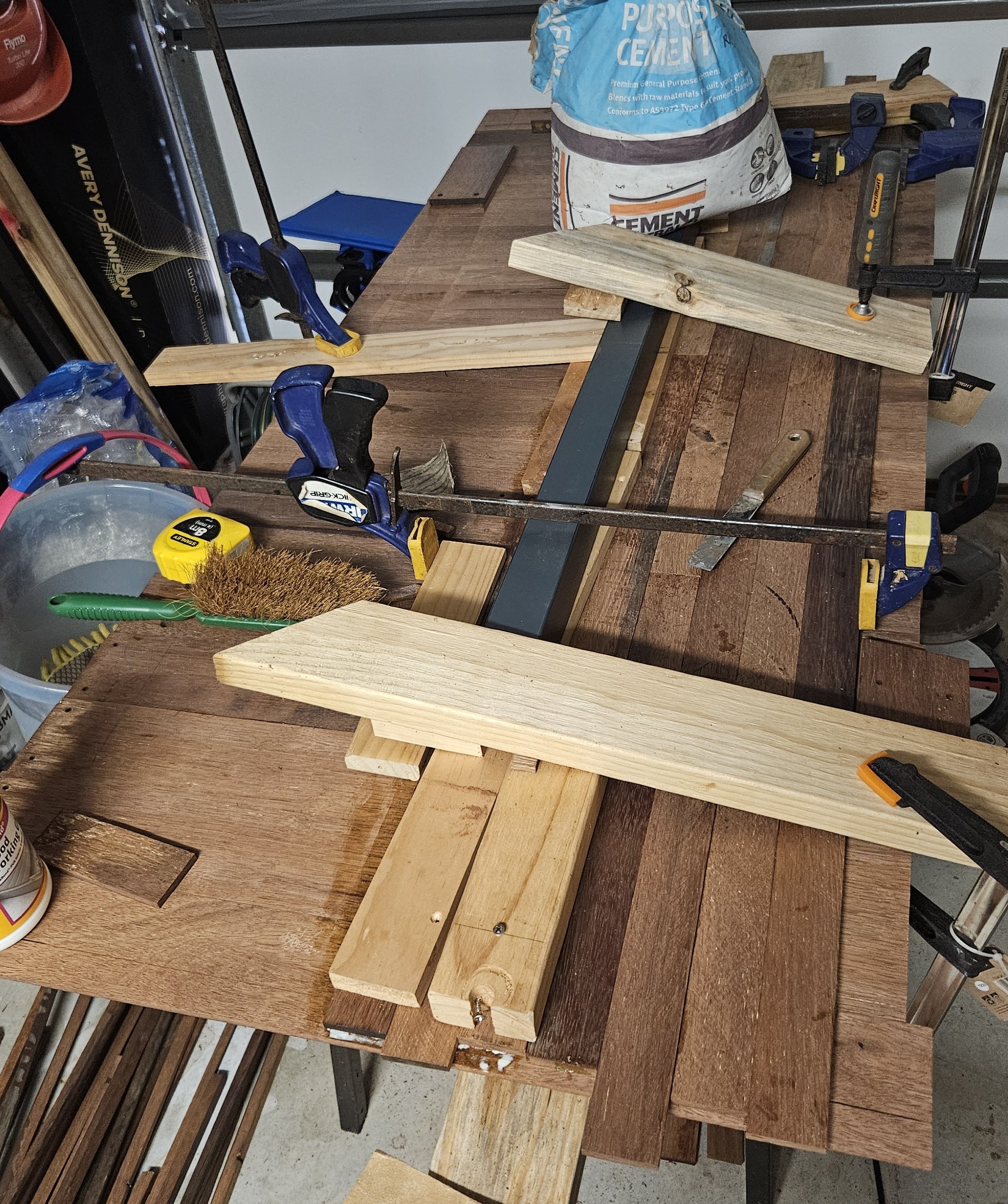 the table is coming together with the top layer being glued down