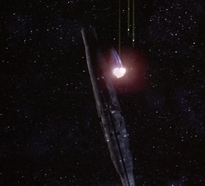 visually stunning space combat with torpedoes striking the shields of the sub-ship