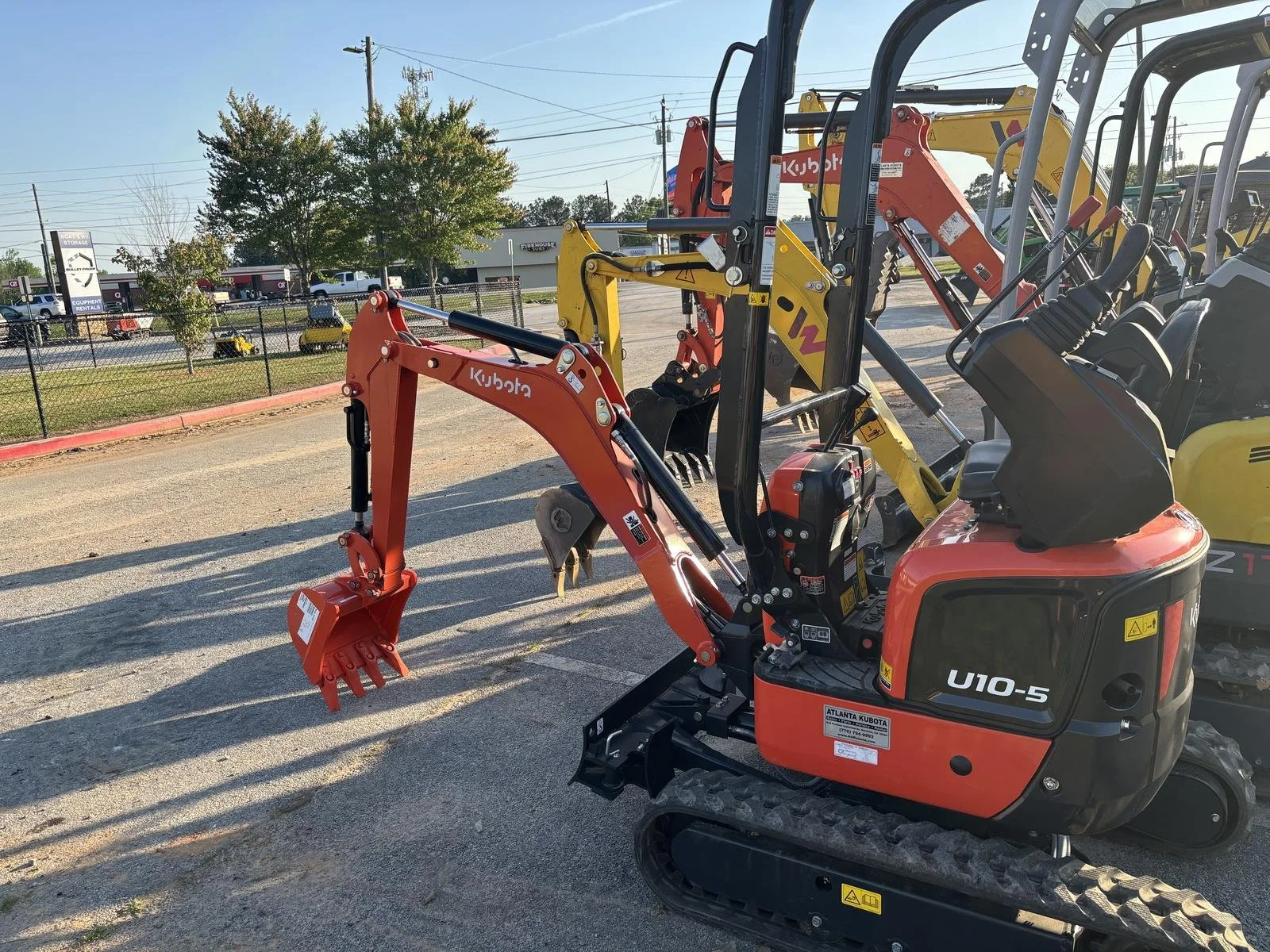 Fleet of excavators at Bulletproof rentals Loganville GA yard