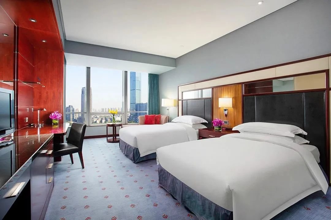 Crown Plaza Wuxi luxury hotel with modern design and premium amenities.