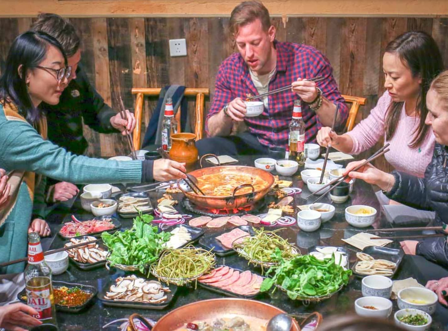 tourists eating together on boutique china escorted tour