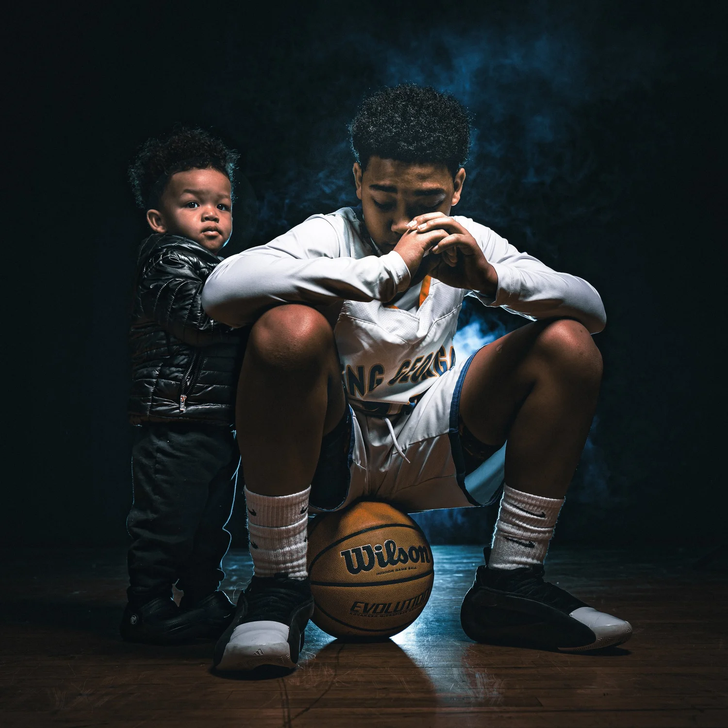 King George Middle School basketball athlete with younger brother photographed by J-Slo Photo