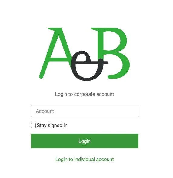Login page for a corporate account with a logo at the top featuring stylized 'A' and 'B' letters in green and black, a text field for account input, a checkbox to stay signed in, a green login button, and a link for individual accounts.