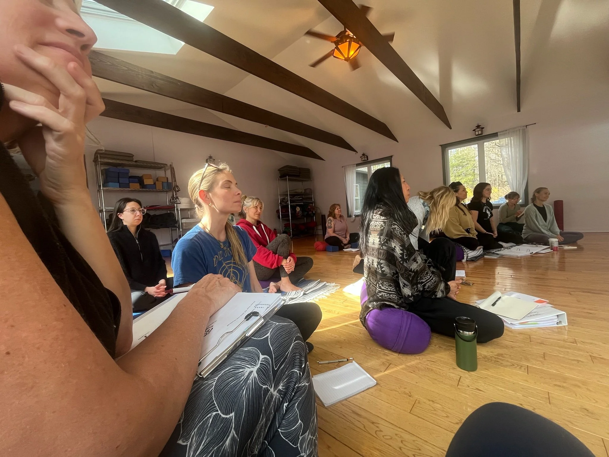 Students learning sequencing and class structure in a Yoga Alliance-certified teacher training at Shakti Yoga in Woodstock.
