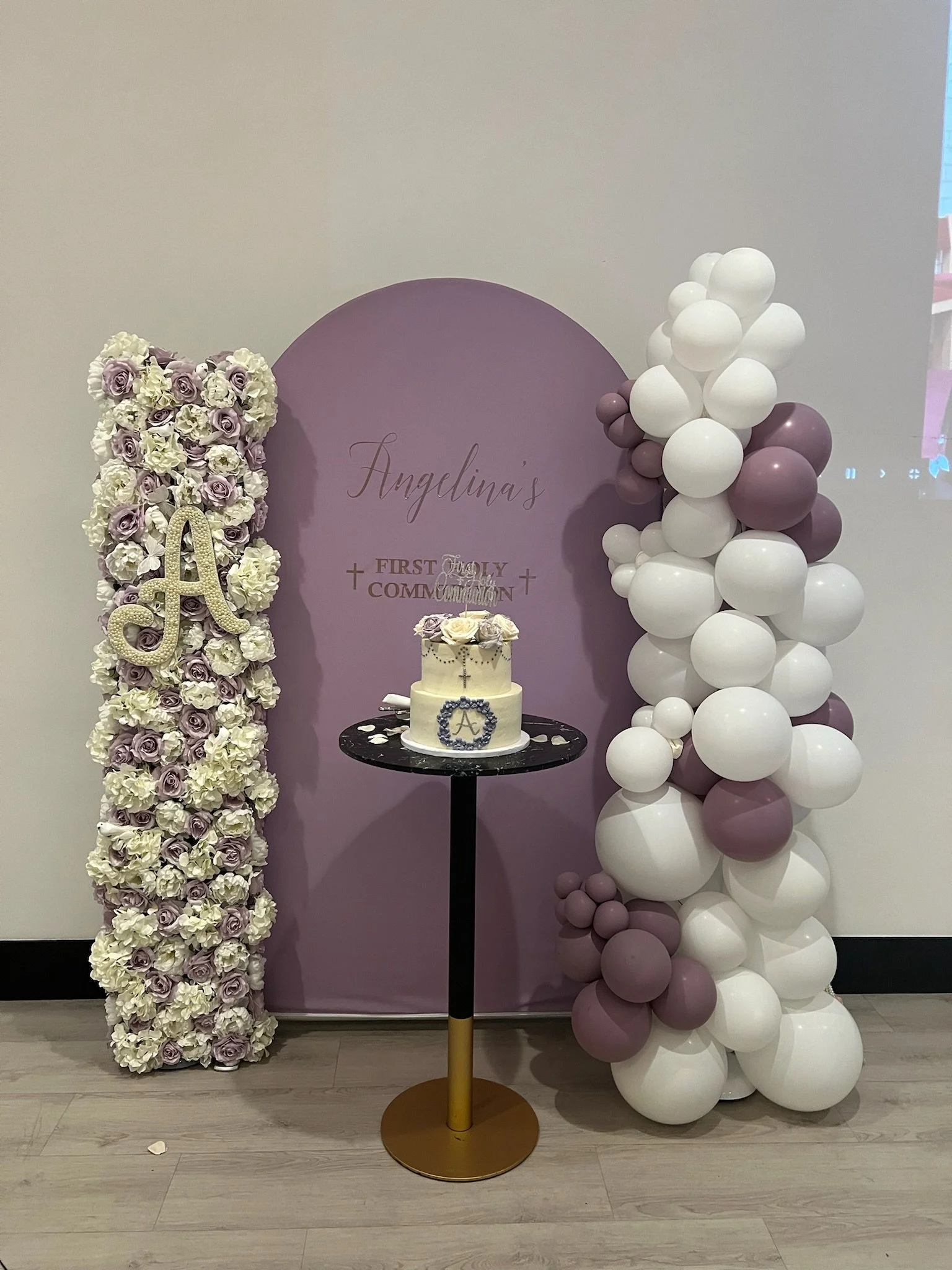 first holy communion balloon arch flower wall.JPG