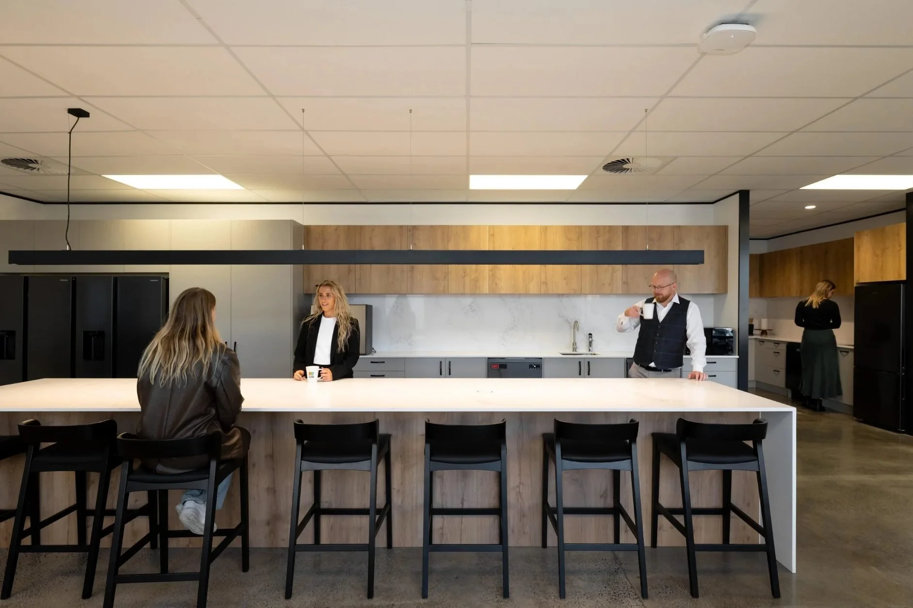 staff kitchen long island bench with drop pendant