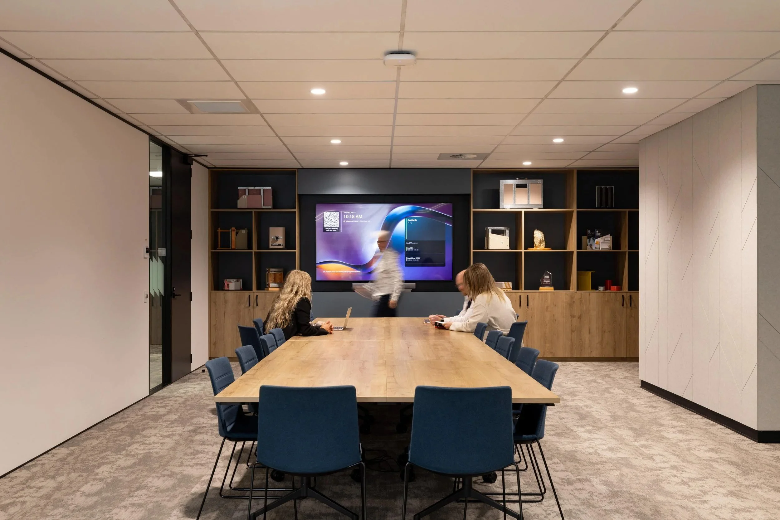 boardroom design with custom cabinetry and acoustics