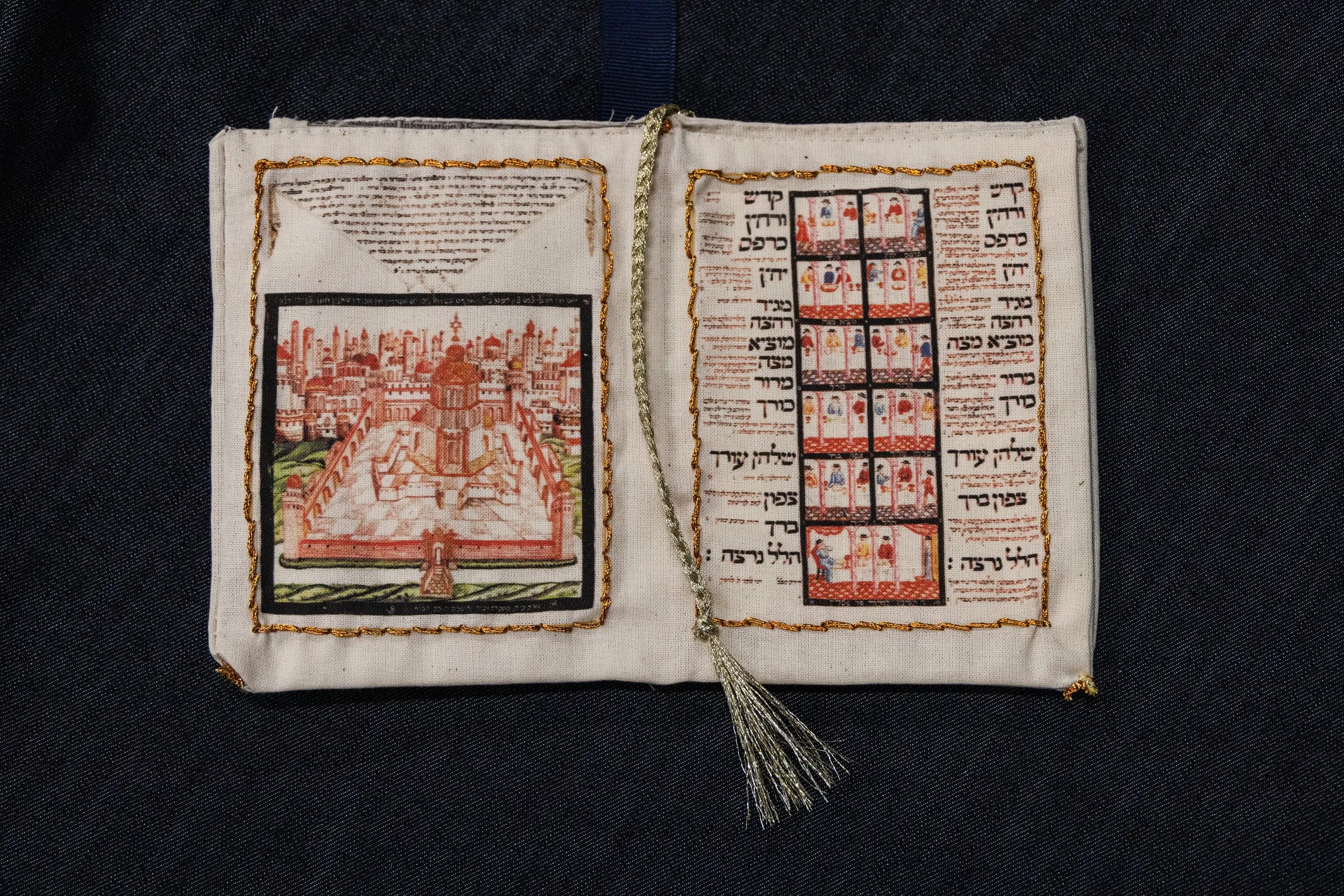 Detachable fabric book detail printed on calico, featuring a Jewish Passover Haggadah.