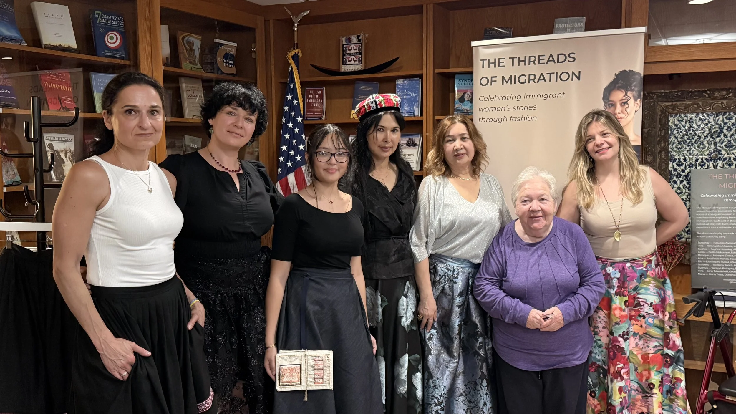 Group of speakers at Threads of Migration event at Georgetown University ICC, featuring women sharing immigrant stories through art and discussion