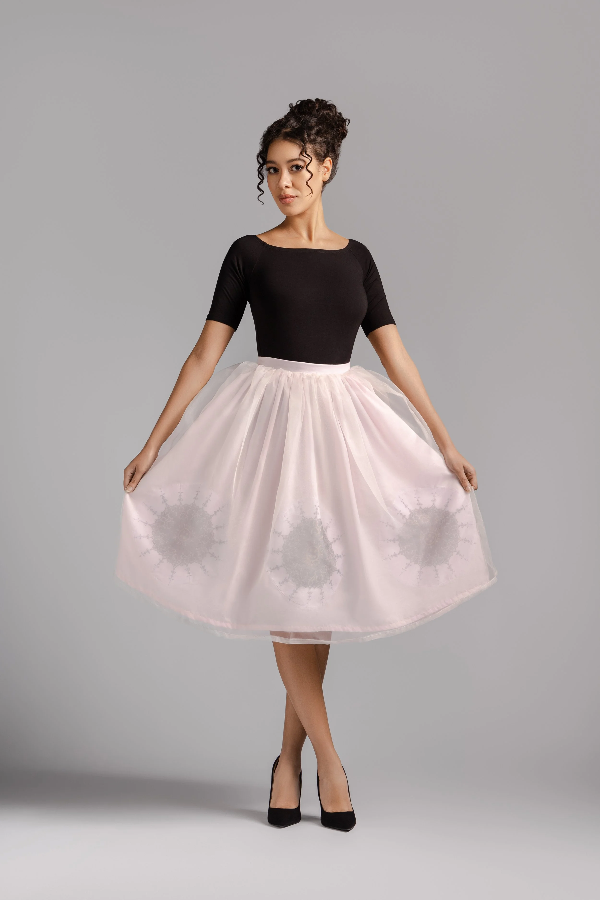 Ivory organza midi skirt with voluminous ballerina silhouette.