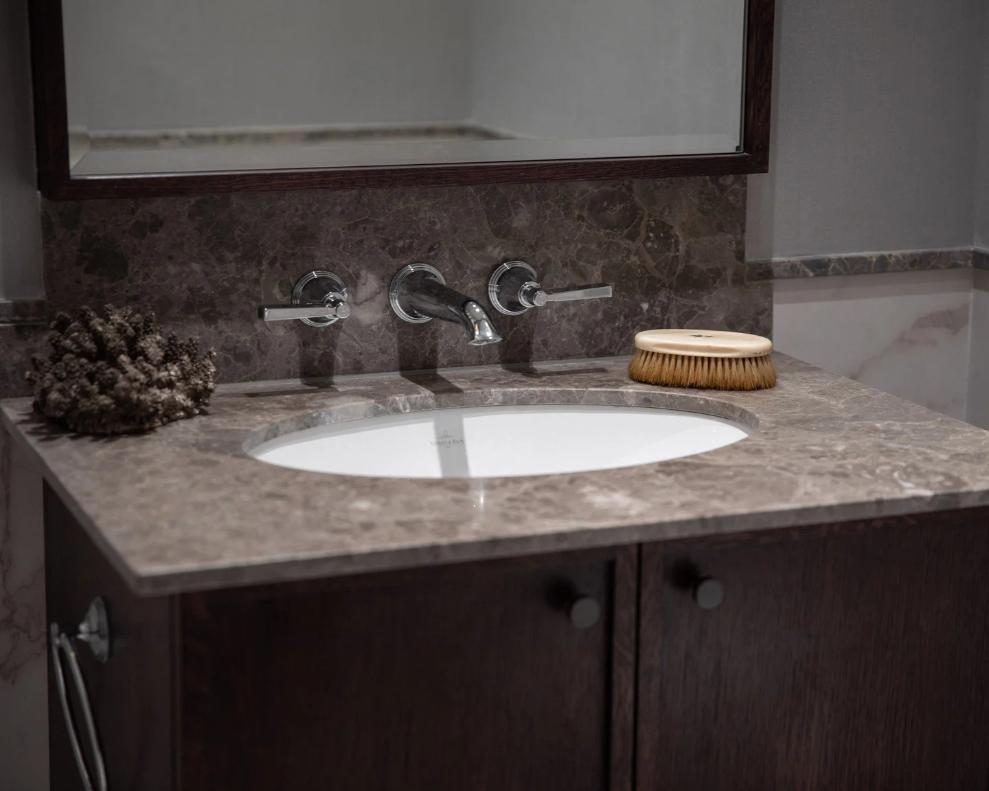 A closeup of the powder vanity; 

- 
tapware from @samuelheathofficial, undermounted sink from @villroyboch