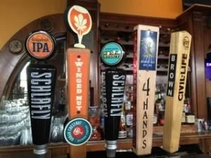 Green Dining Alliance beer taps at a local restaurant.