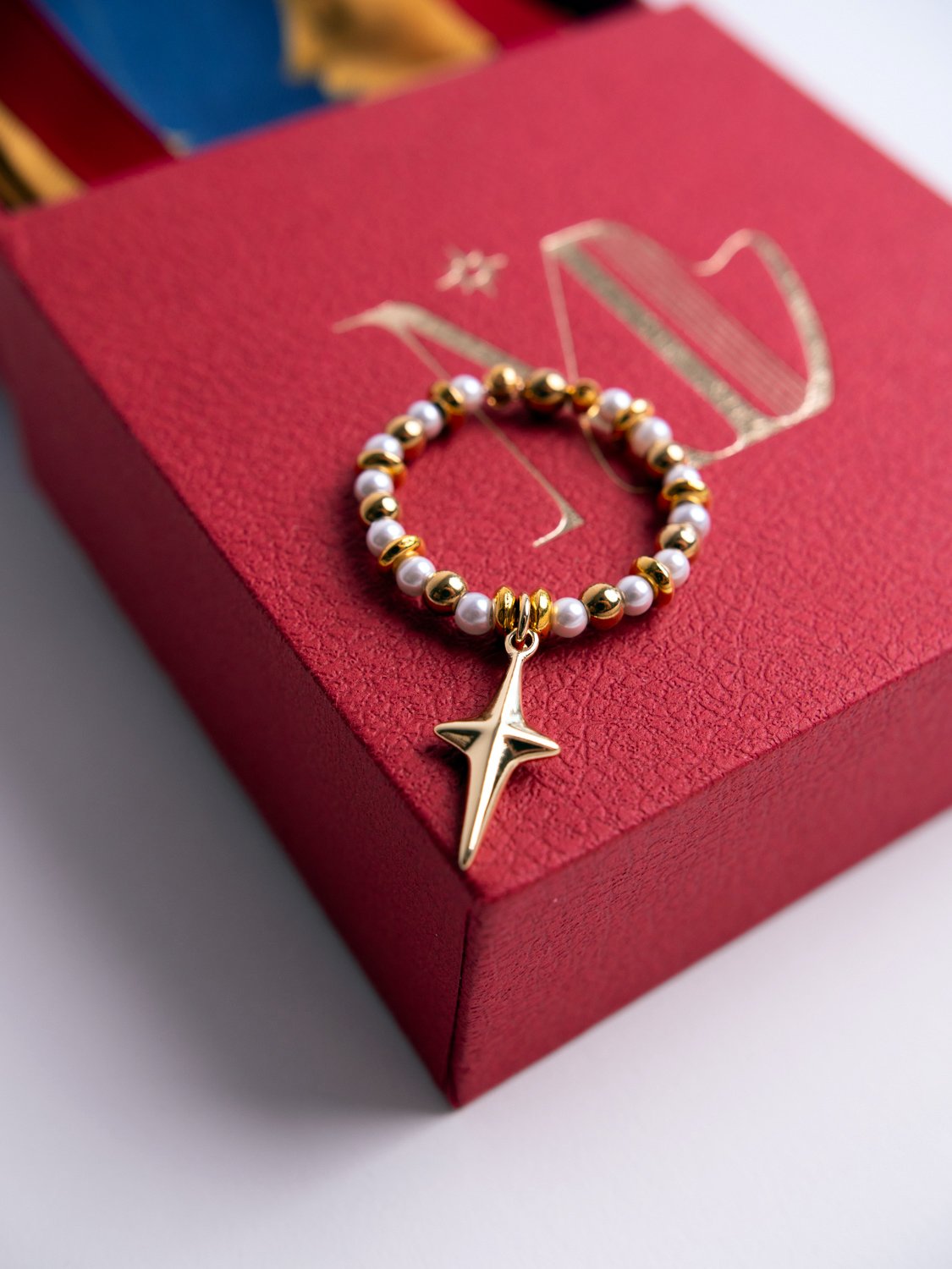 golden-star-scarf-ring-by-call-the-muse.jpg