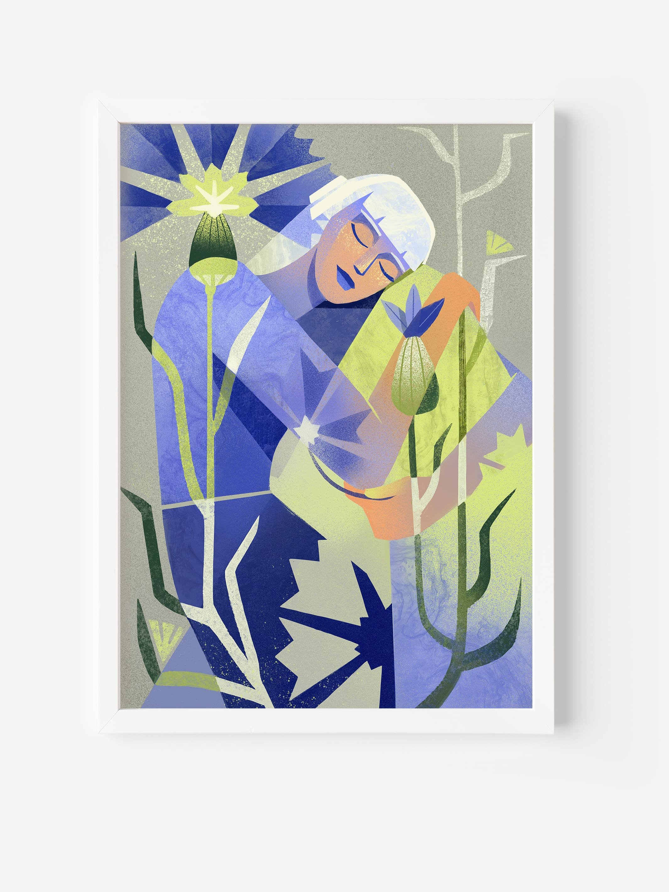 Framed fine art print of a woman surrounded by cornflowers with eyes closed. Emotional wall art about softness, presence, and feminine stillness.