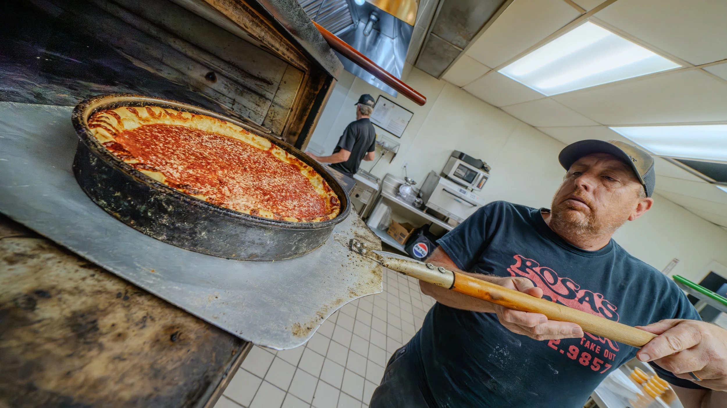 rosas pizza out of the oven.jpg