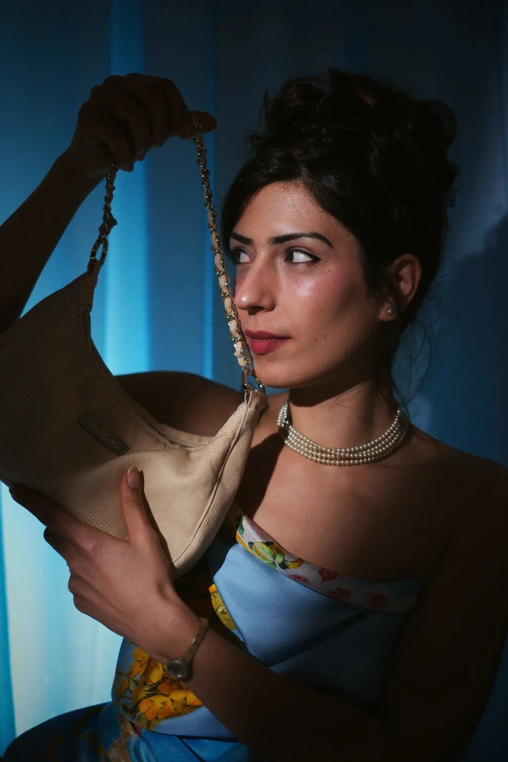 Woman wearing Blue Sky silk scarf.