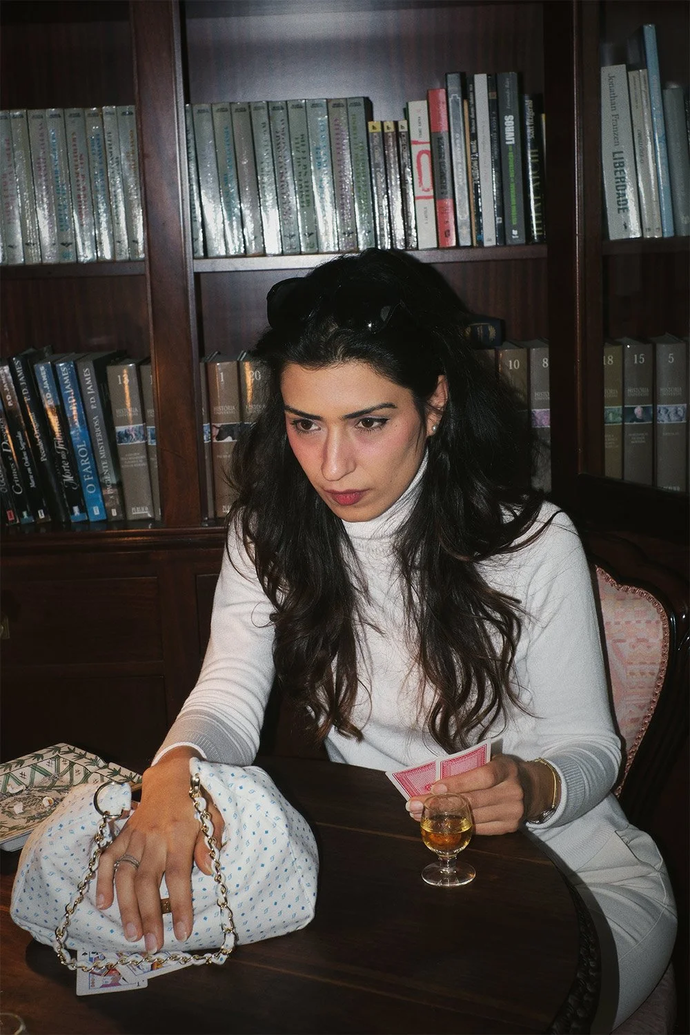 Sienna bag in a poker game.