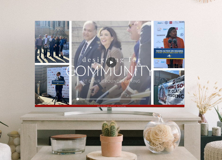 A collage on a TV screen showing a community event with people in formal attire on stage, a woman at a podium with "Taking Action on Housing" signage, and a "Coming Soon, St. Clair Residence" banner.