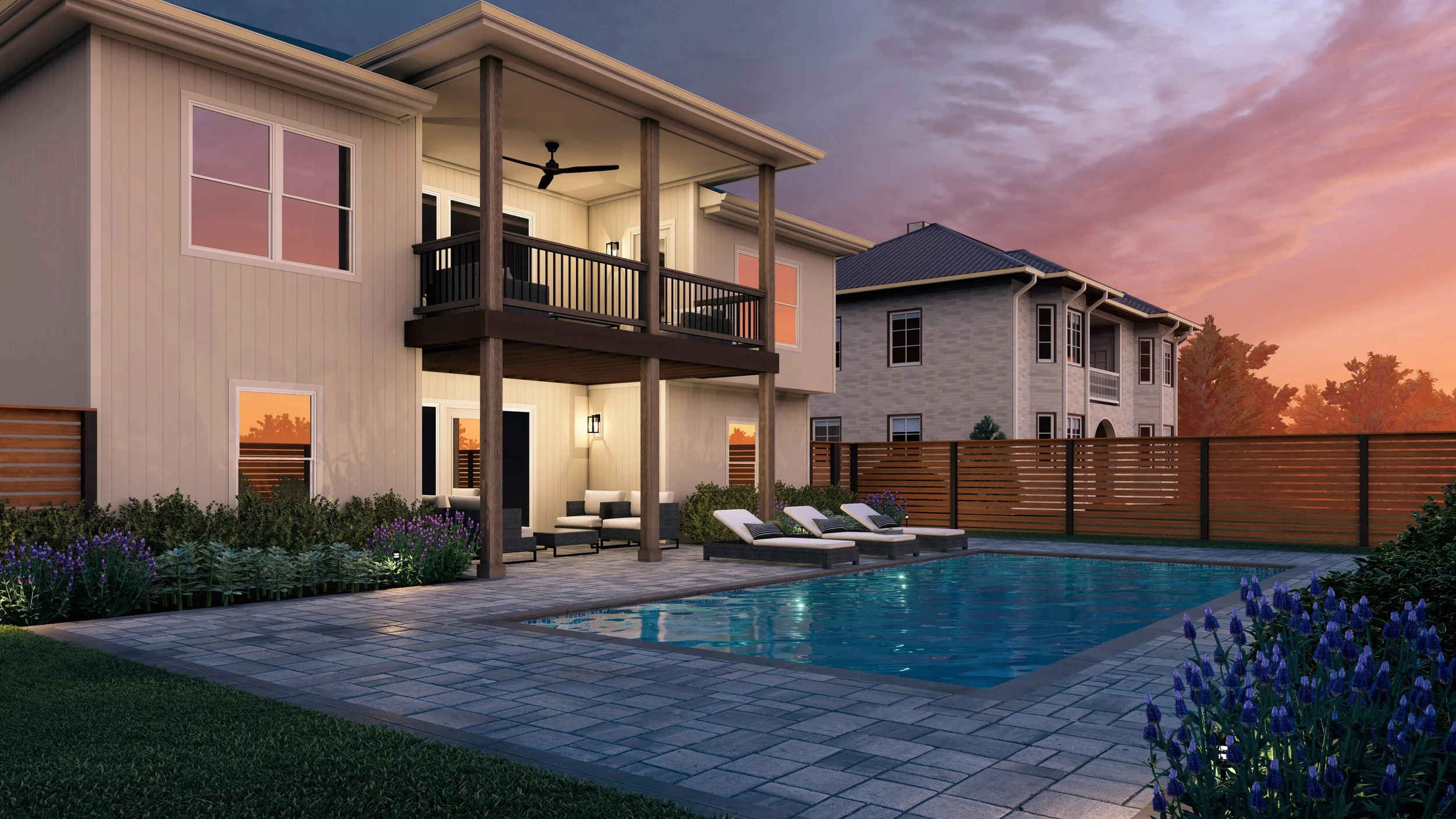 A backyard with a swimming pool, lounge chairs, and outdoor seating area, with a two-story house featuring a balcony and a sunset sky in the background.