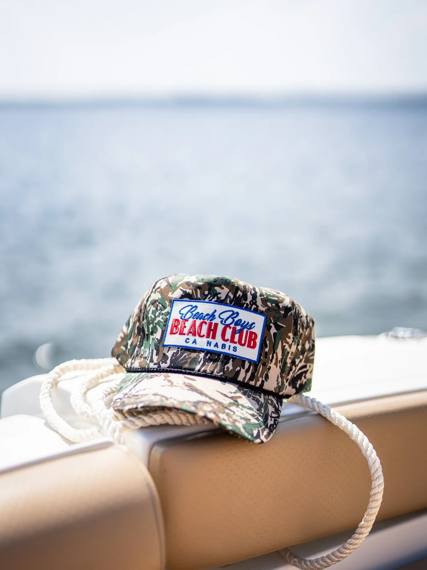 THE BEACH CLUB IS OPEN!! 10am-7pm EVERY DAMN DAY. New #camo #hats in #oob #oldorchardbeach 🤙 #Maine #merch #mainesendlesssummer 

Made for @bb.beach.club @beachboys.style 
Modeled by @tmomofosho 
Design + photos by @this.iswork