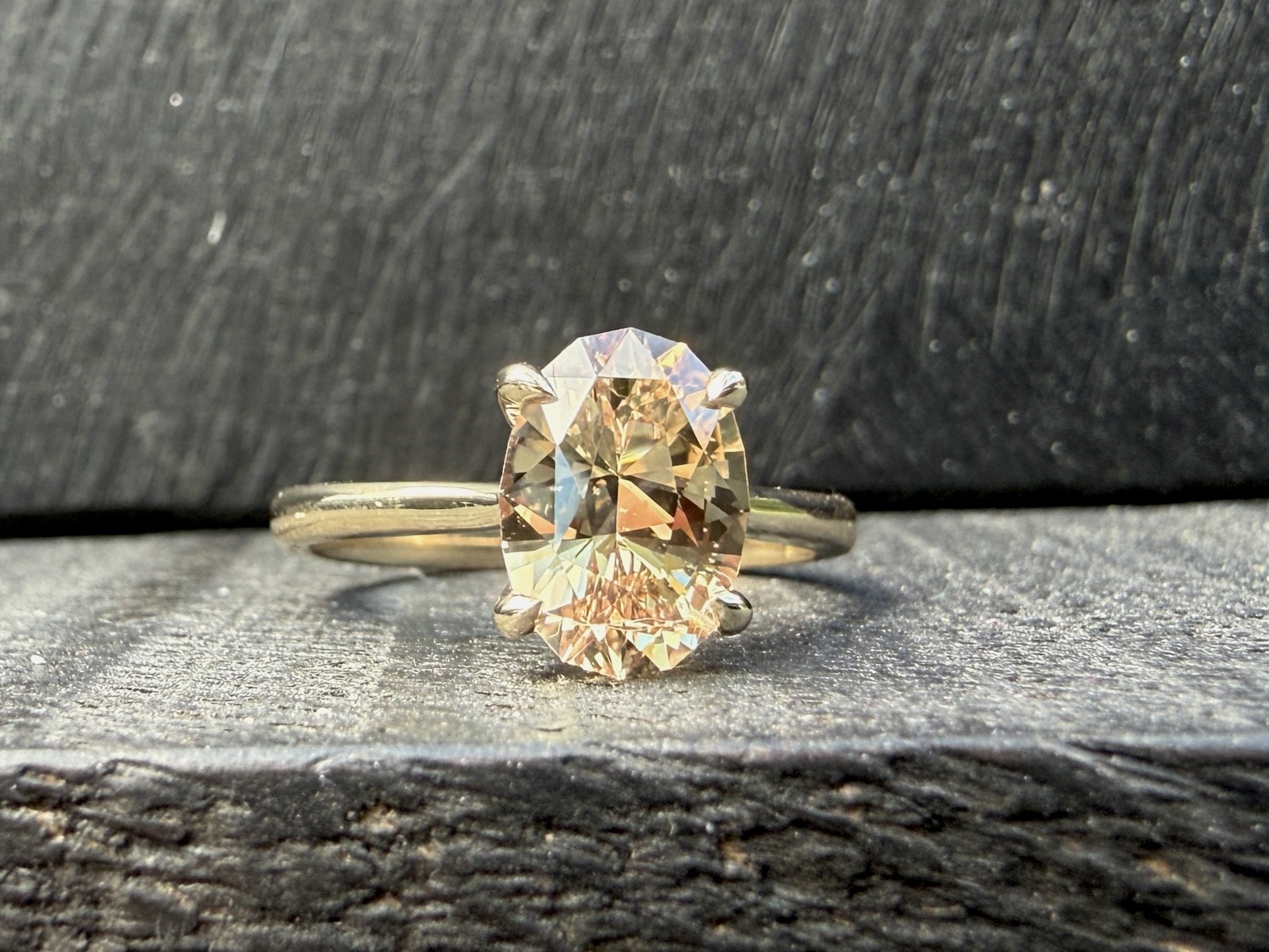 Unheated natural peachy pink sapphire. 14K 
