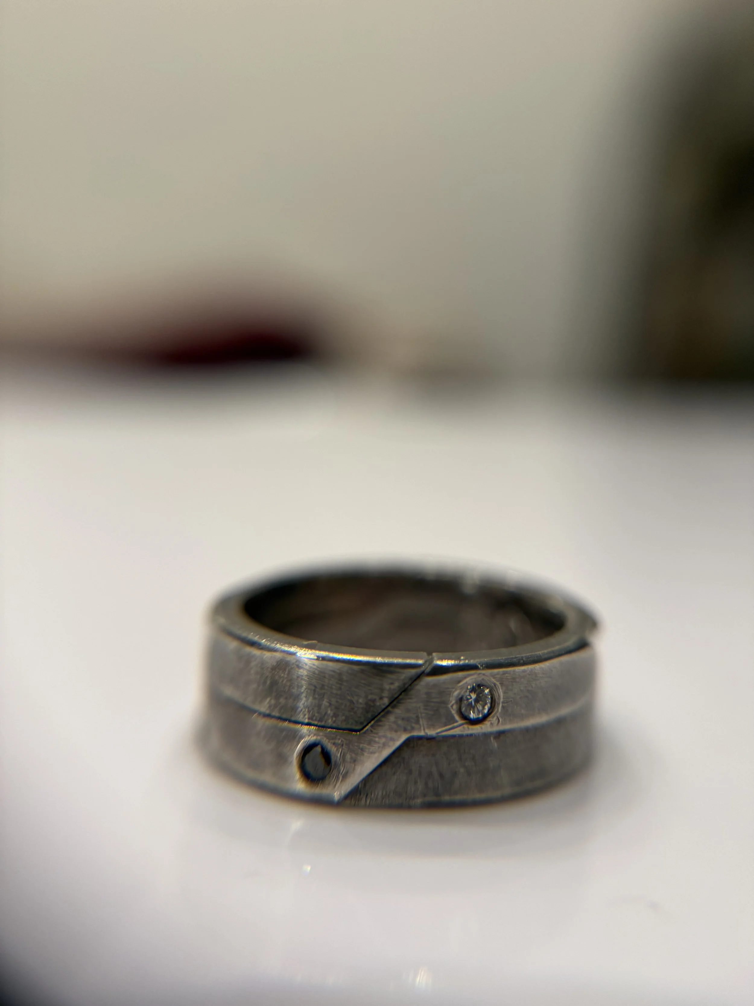 A commentary on the positive and the negative of life. Two rings split apart