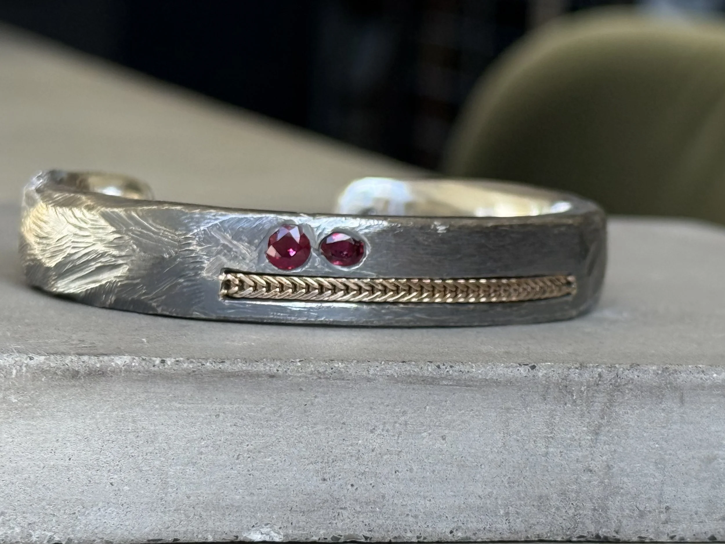 In memory of Mom. Using some of her lost stones and chain. A bracelet for her son. Sterling silver, 14K gold, Ruby, Diamond