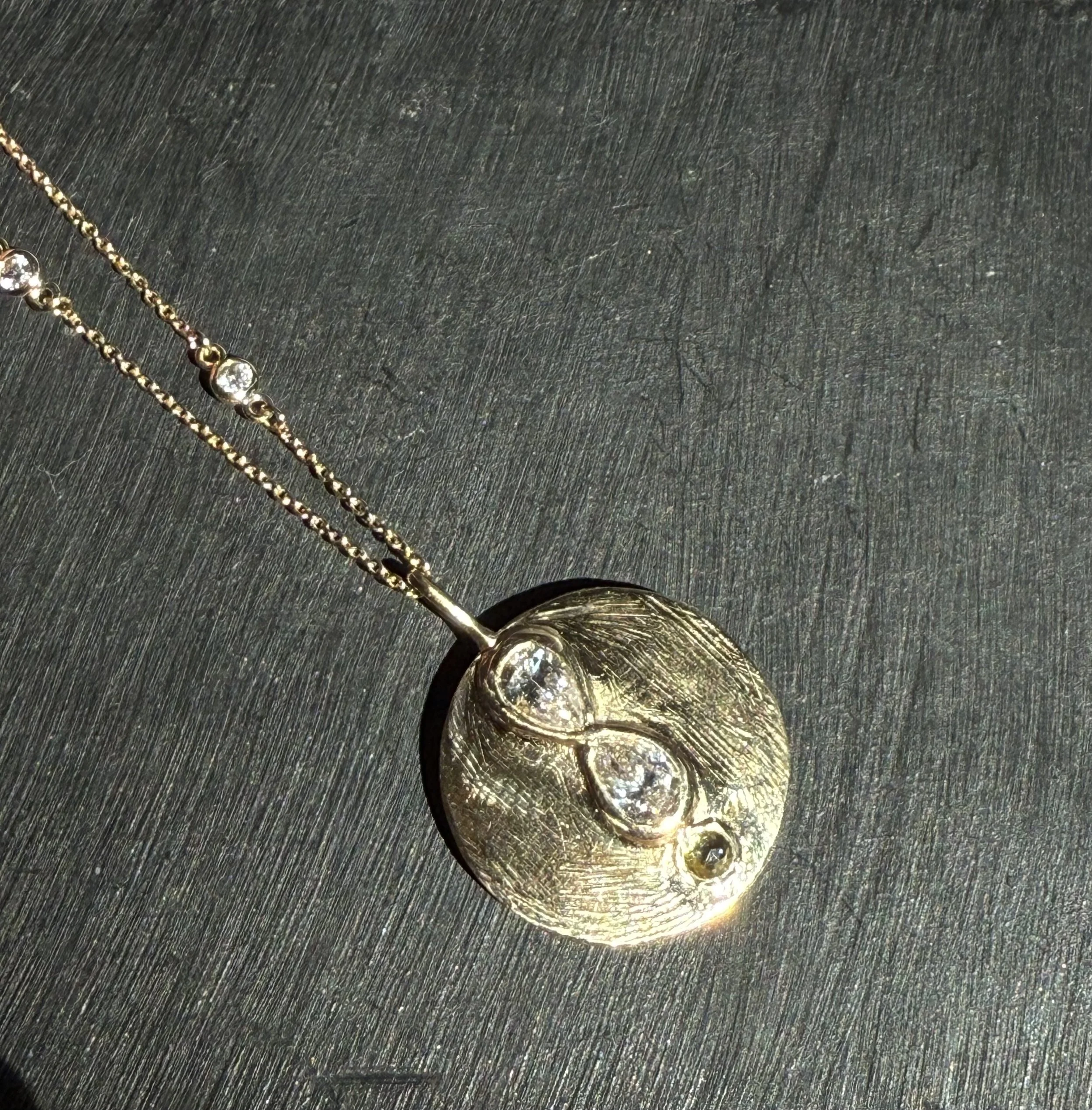 A push present.  To infinity. Yellow and white diamond, 18K.