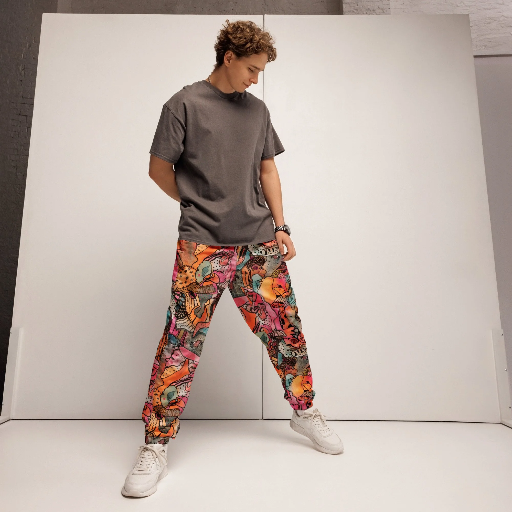 all-over-print-unisex-track-pants-black-front-6a0ce2a9bd9ff.jpg