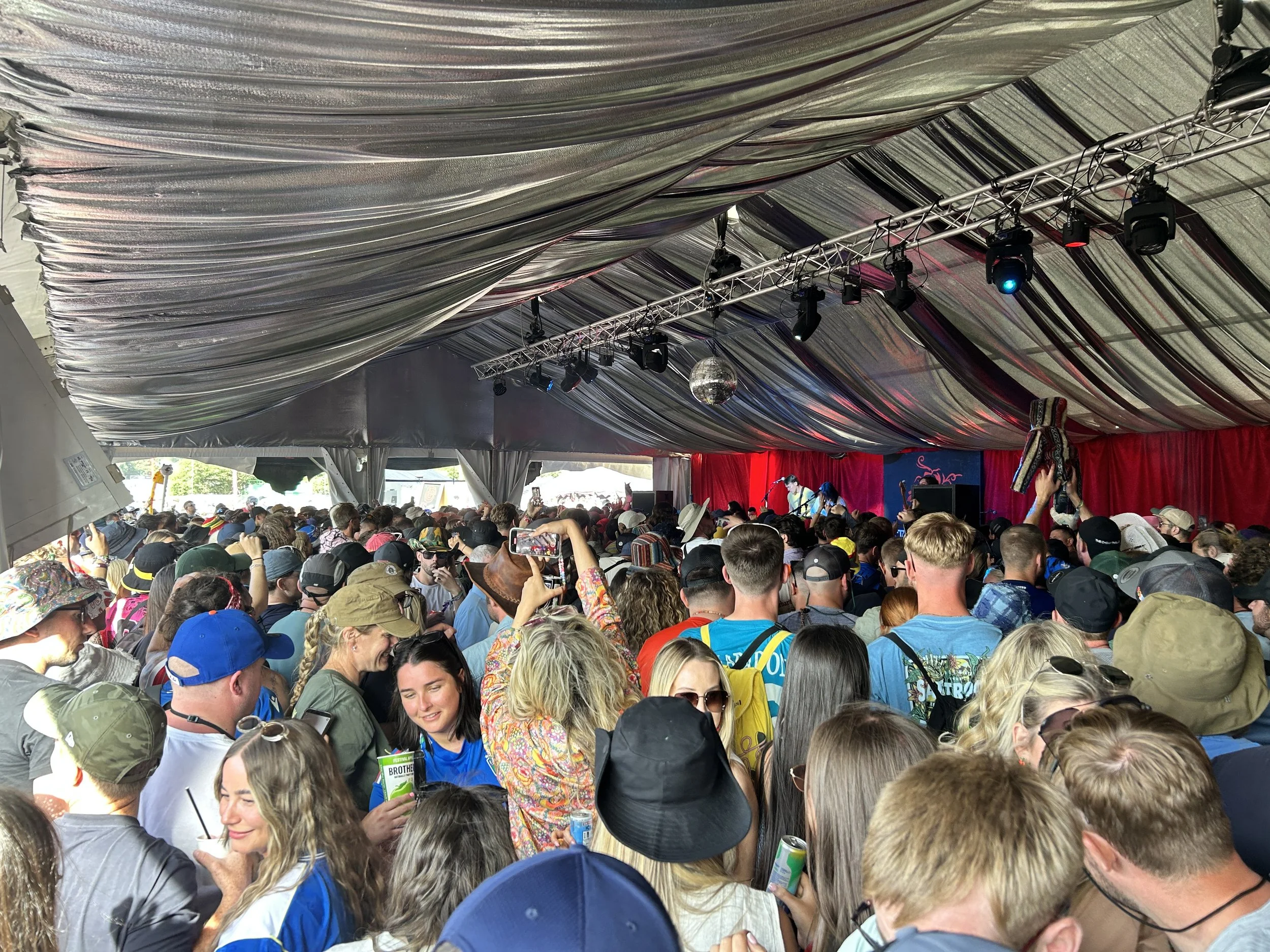 Scotty Rockstar running FOH and stage production at the Bread & Roses Stage, Glastonbury Festival.