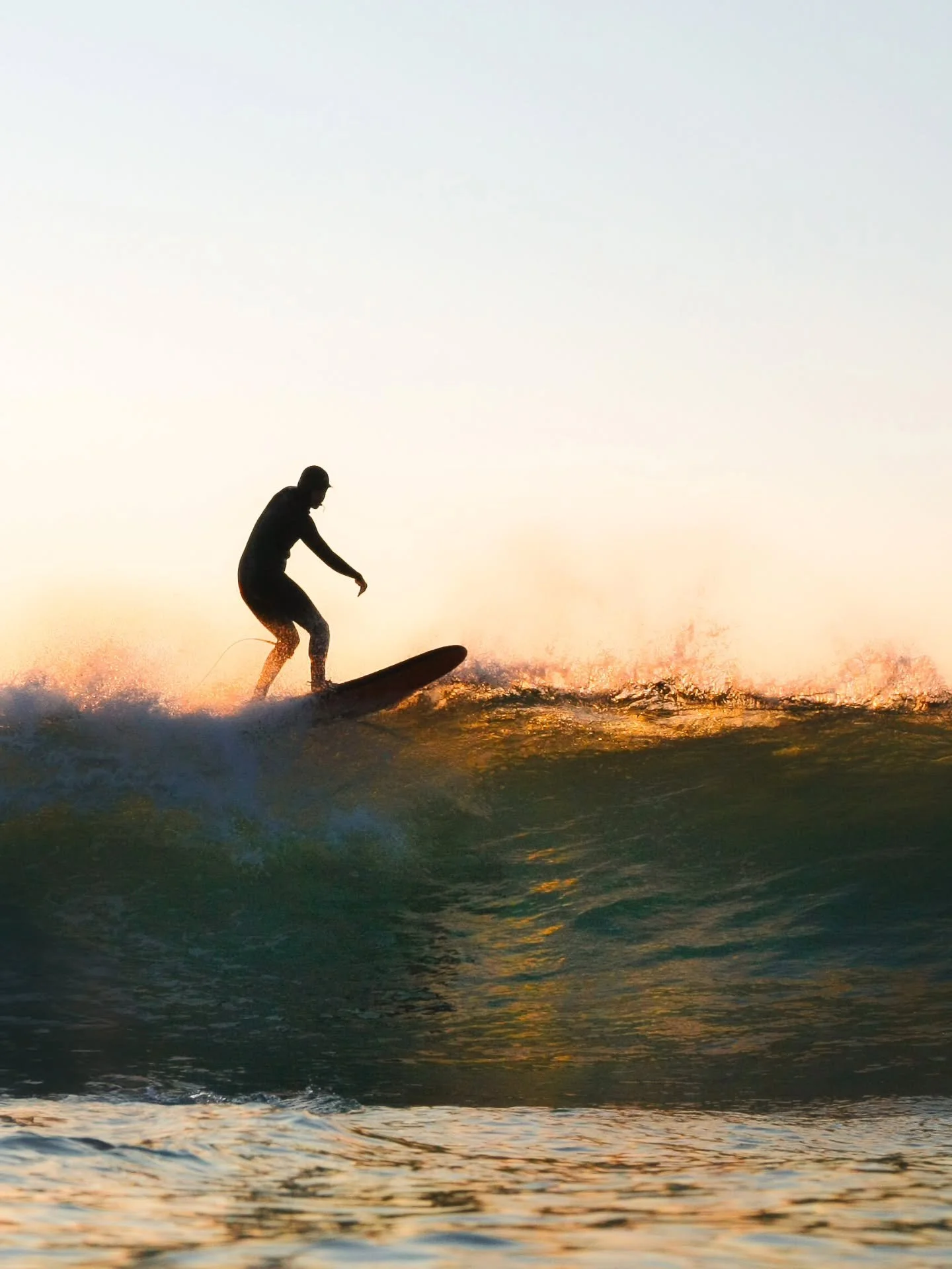 L O W  L I G H T

Golden light, icy water, and that moment where winter almost feels kind.
Backlit by a low winter sun, this wave lit up just enough to make you forget how cold it really was&hellip; almost.
Counting down the sessions until numb finge