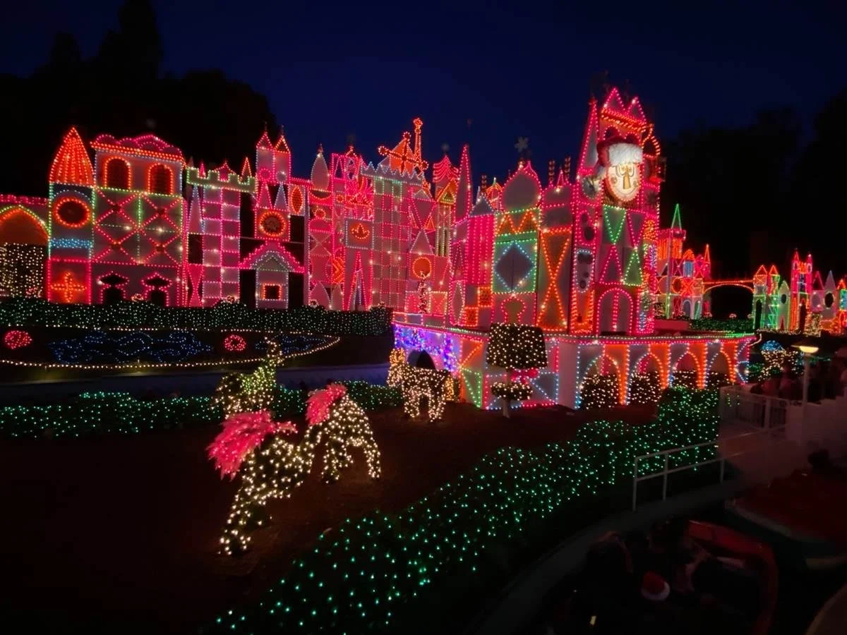 The “it's a small world” attraction illuminated with colorful Christmas lights at Disneyland.