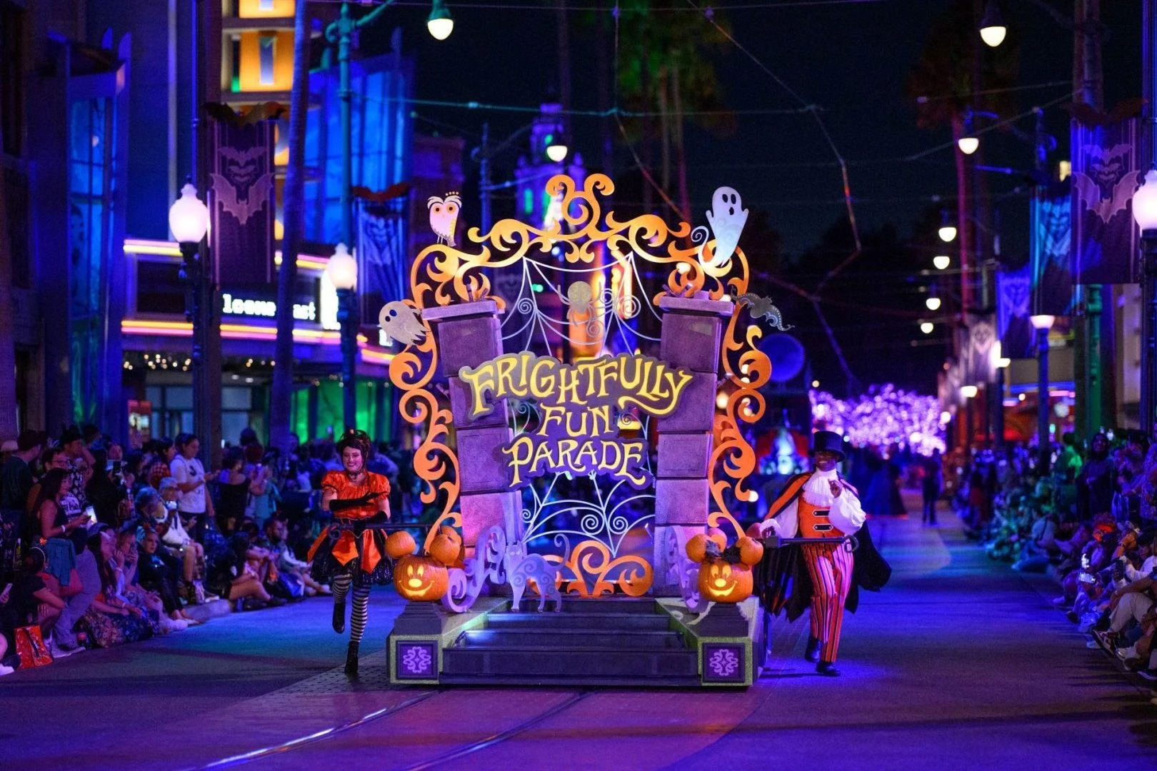 Mickey Mouse and Disney villains perform in the Frightfully Fun Parade during Oogie Boogie Bash.