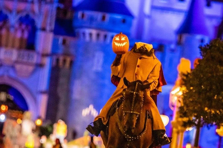The Headless Horseman rides through Magic Kingdom before Mickey's Boo-to-You Halloween Parade.