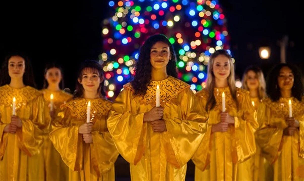 Choir, orchestra and narrator performing the Candlelight Processional at EPCOT.