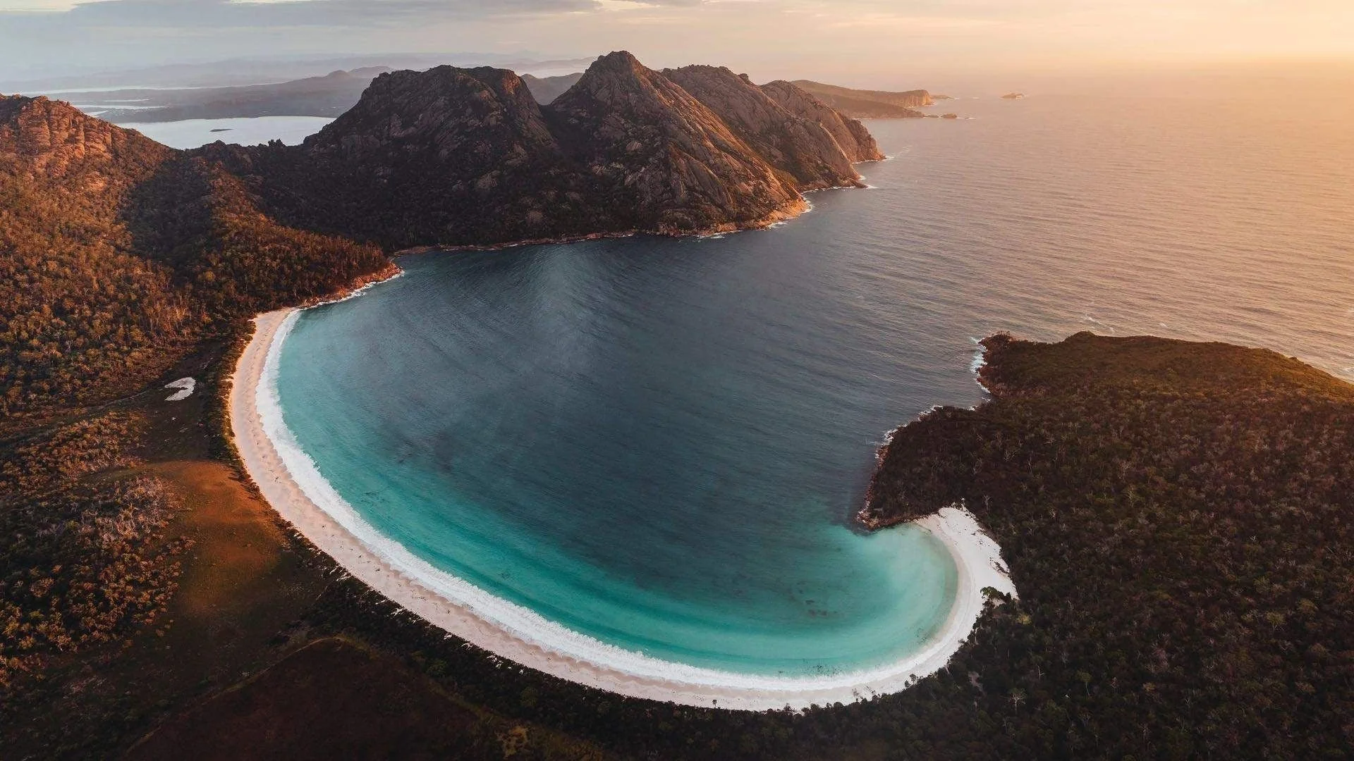White sand and turquoise water at Wineglass Bay in Freycinet National Park, Tasmania.