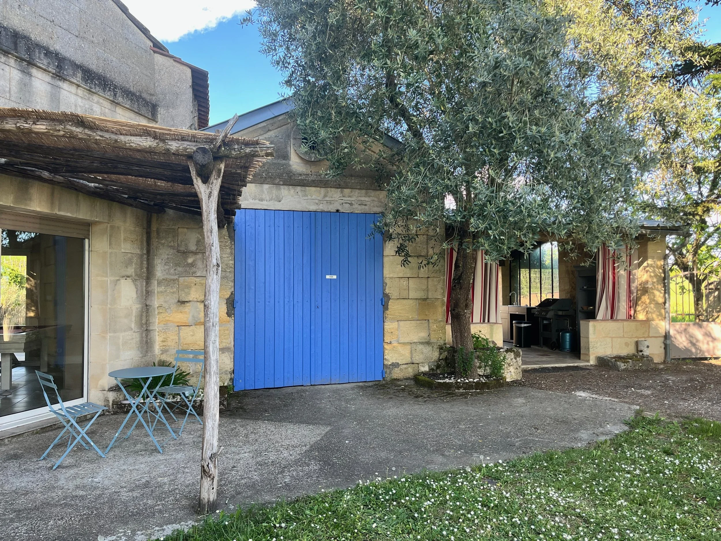 Bistro table and outdoor kitchen