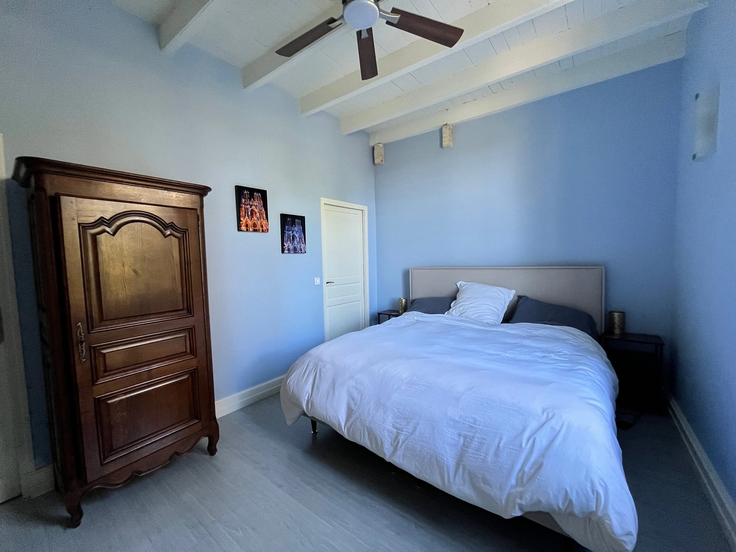 1st bedroom with king-sized bed and ensuite bathroom