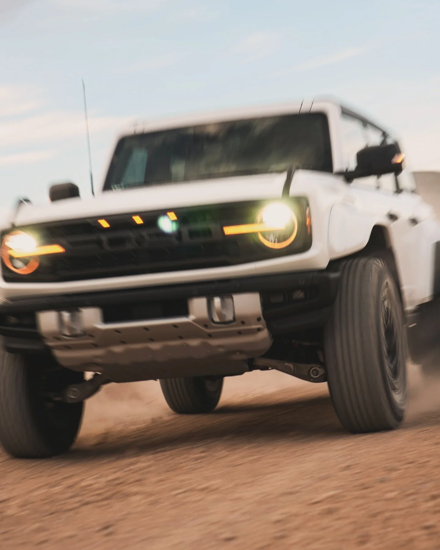 Desert dawn, dust flying, Bronco Raptor unleashed. 🌅💨 #TrailBoss #BroncoRaptor #SunriseShred @shelbyhalloffroad @fordbronco @protectivefilmsolutions @bfgoodrichtires @broncobarn @fordperformance