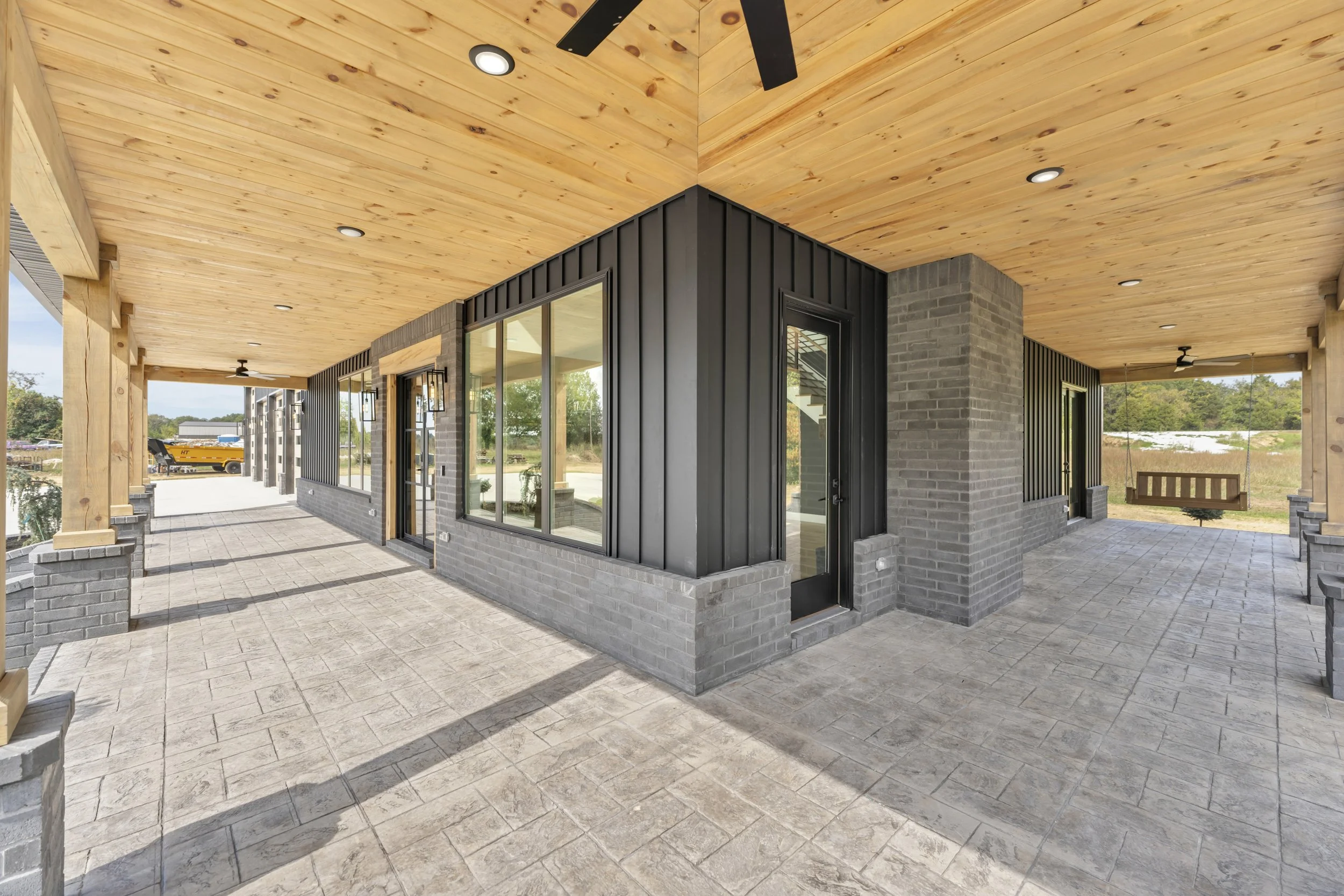 Corner of Stamped Concrete Porch with Swinging Porch