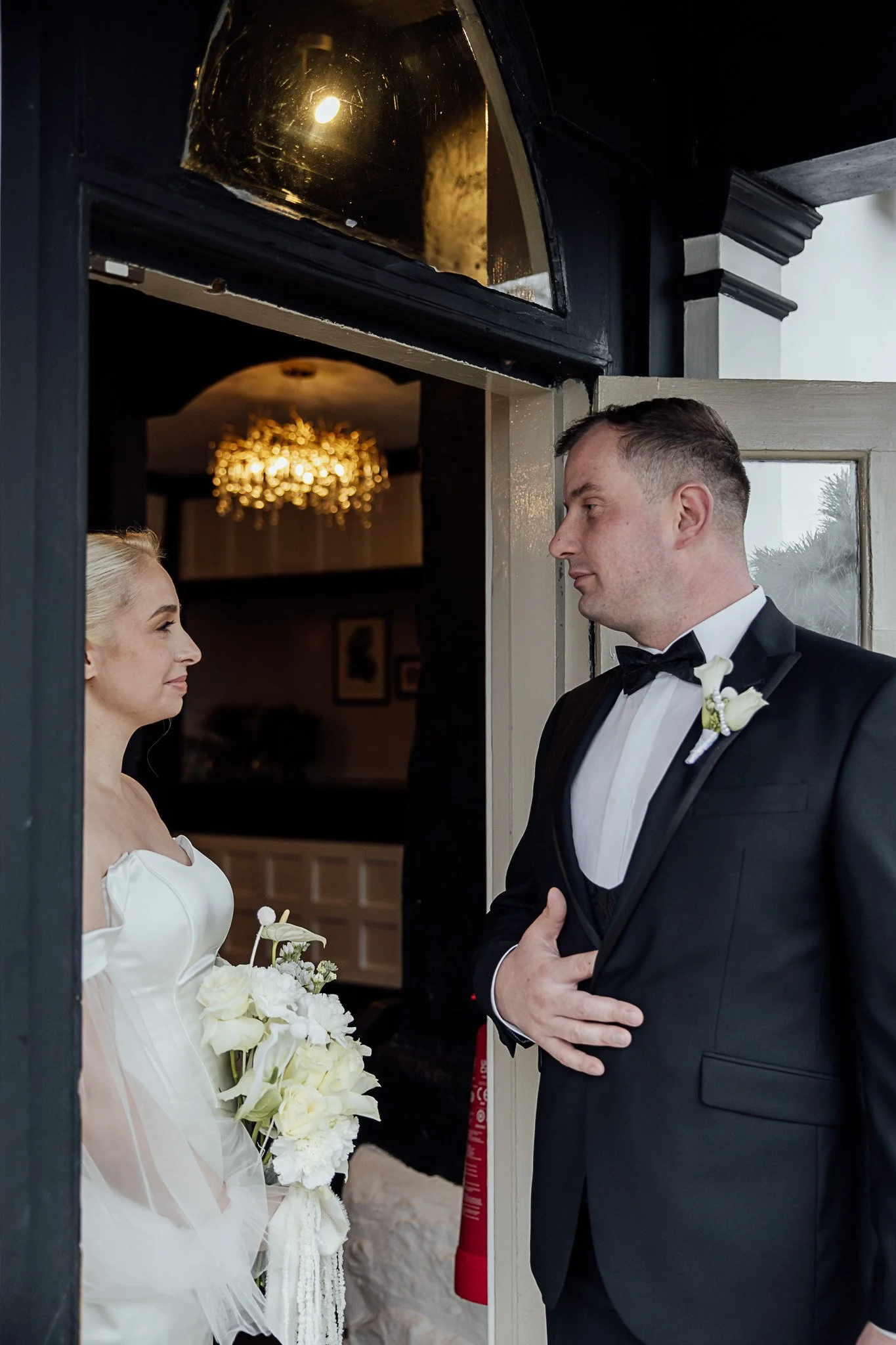 Bride and groom captured at The Orchard wedding venue, styled with classic florals and timeless details.