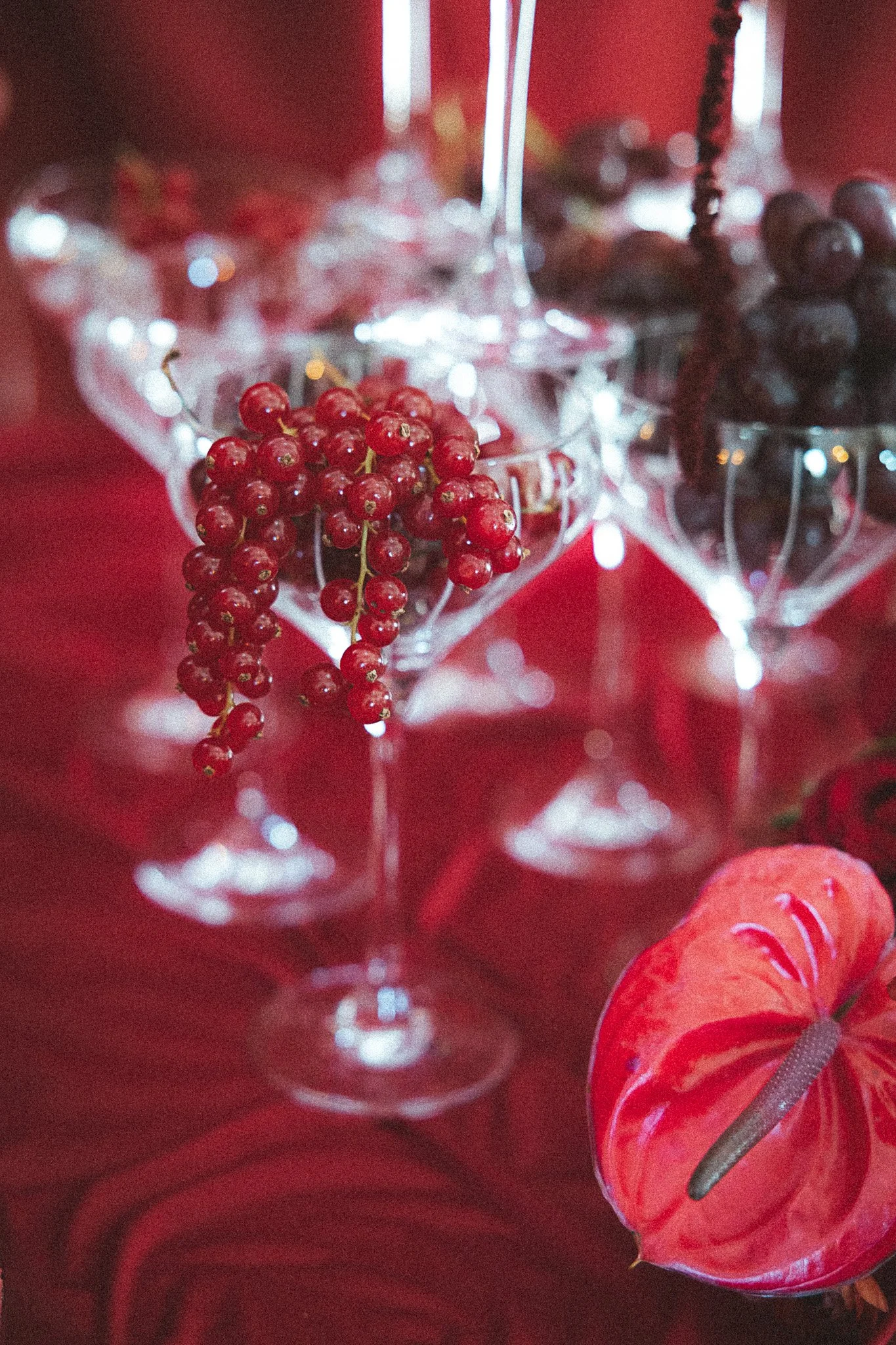 Luxury tablescape styling with glassware and red accents at Byre Barn Kent