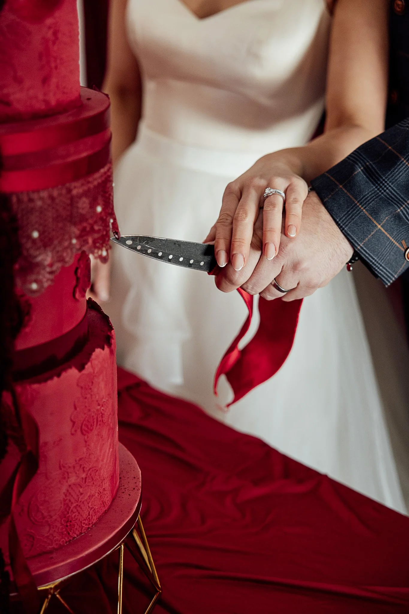 Hands holding ribbon and styling detail at Byre Barn Kent wedding styled shoot