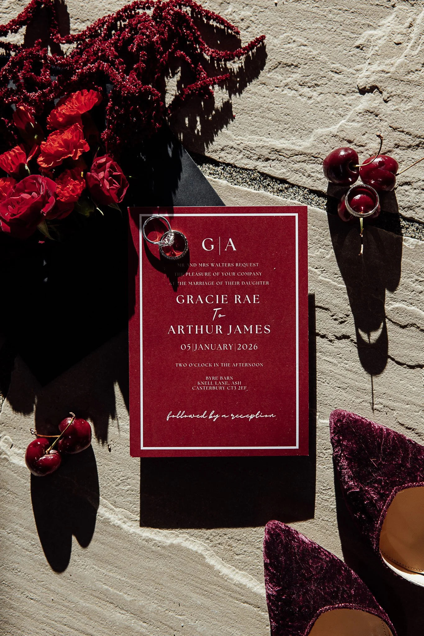 Luxury wedding stationery styling with deep red palette at Byre Barn Kent styled shoot