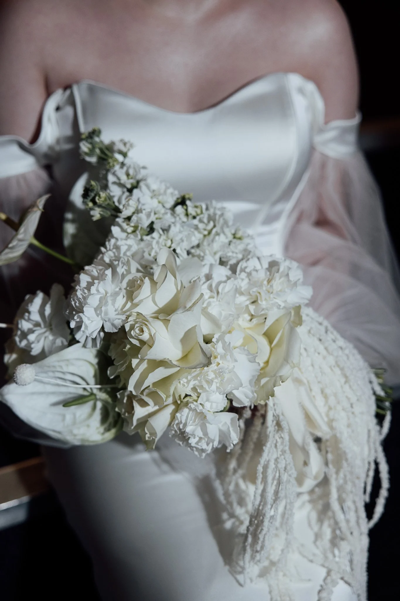 Elegant white wedding bouquet featuring roses and seasonal florals, designed for a styled shoot in Kent.