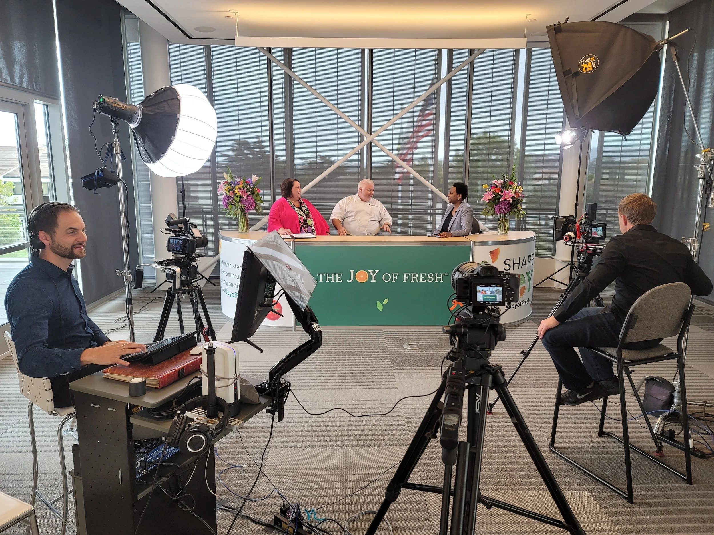 AMP production crew filming a community event