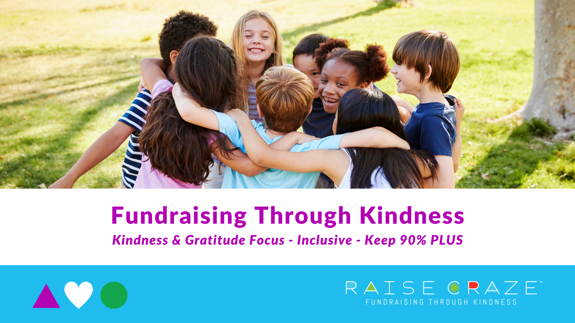 A diverse group of children hugging and smiling outdoors on a sunny day, with trees and grass in the background.