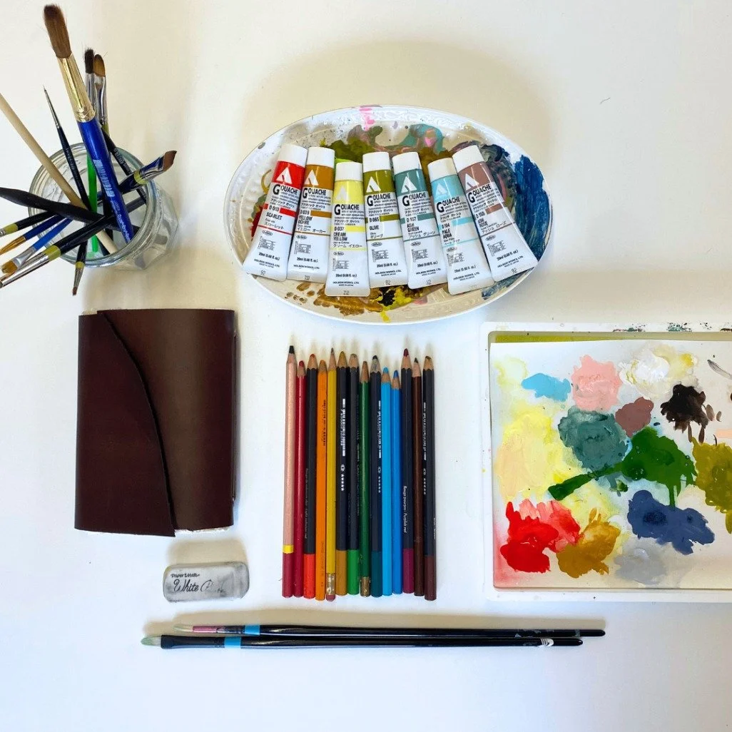 My studio is a rainbow of paint tubes, brushes, sketches, and swatches: all the essentials for bringing joyful patterns to life. Love how each brushstroke and color trial fuels fresh ideas for textiles and wallpaper.