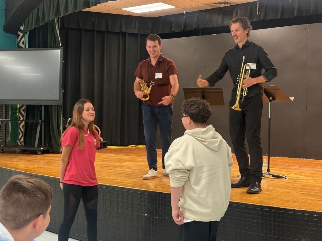 Seven Hills Chamber Music artists working with students in chamber music exercises