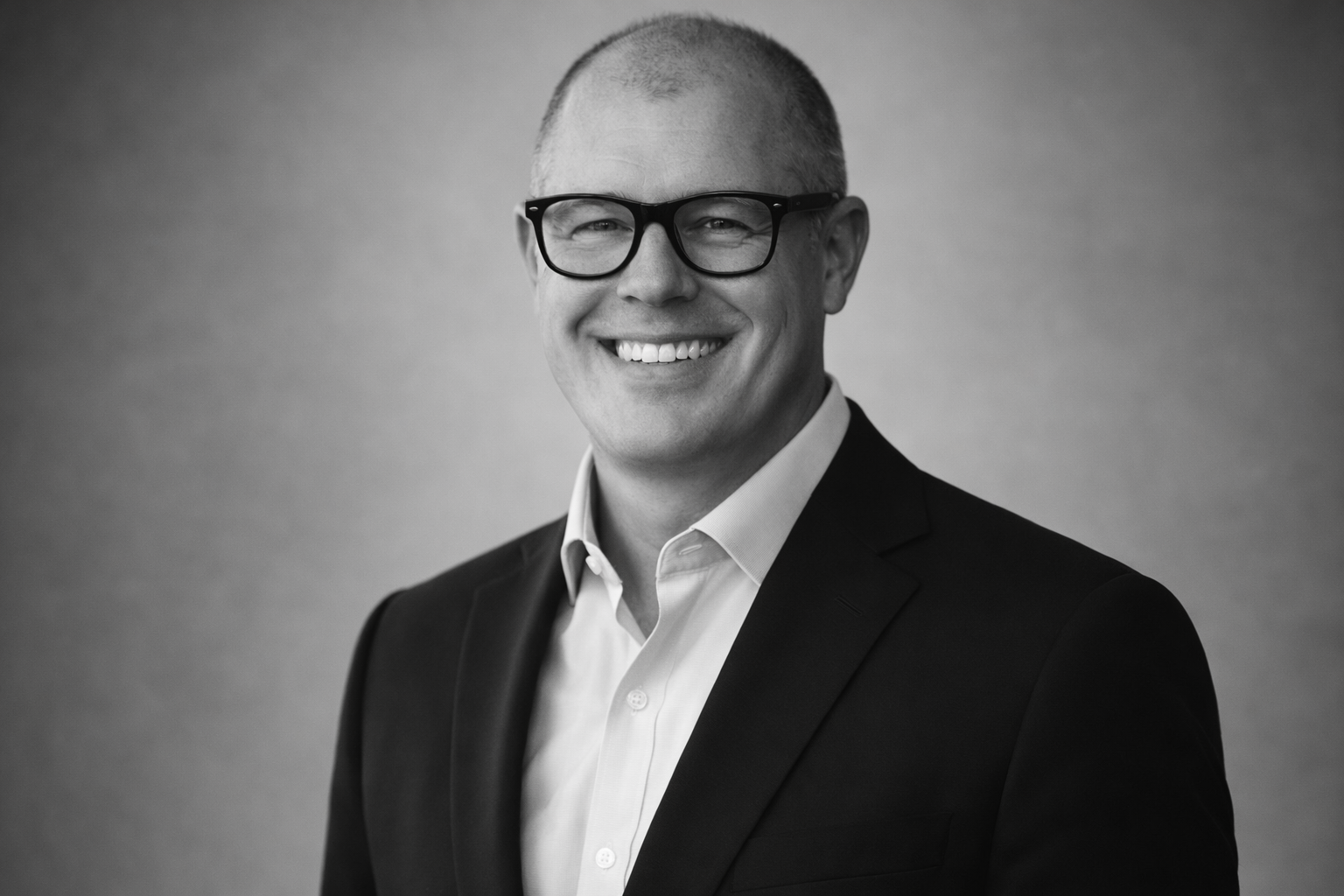 Black and white portrait of Ray Hassall